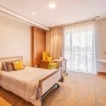 Aged care suite shown in Bed + sitting area configuration